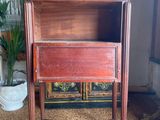 an image of a wooden cabinet with a drawer on top of it