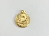 a gold coin with the image of a man and a woman on it