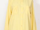 a mannequin mannequin wearing a yellow shirt on a mannequin mannequin mannequin mannequin mannequin mannequin mann