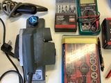 a lot of electrical equipment on a table