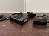 a table with a lot of electronics on top of it