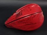 a lot of autographs on this red helmet