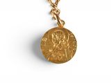 necklace with a gold coin on a gold chain on a white background