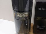 a bottle of macaron powder next to a box on a table