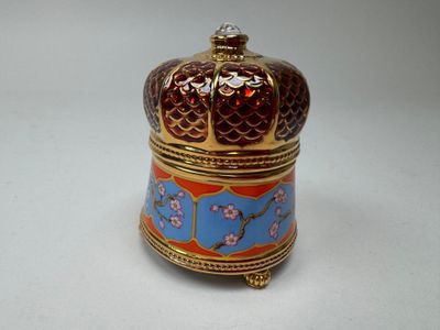an image of a decorative box on a white surface