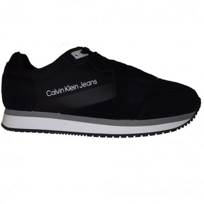 a close up of a pair of black sneakers on a white background