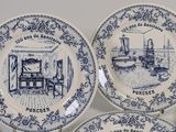 six blue and white plates with a picture of a woman in a living room