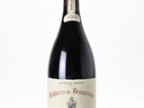 a bottle of wine that is sitting on a table