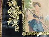 a picture of a woman holding a stick in a picture frame