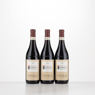 three bottles of wine sitting on top of a table next to each other
