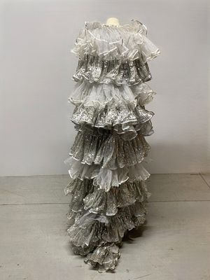 an image of a mannequin with a dress made of plastic bags