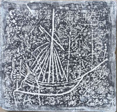 a black and white drawing of a boat on a piece of paper