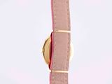 pink leather watch strap with a gold buckle