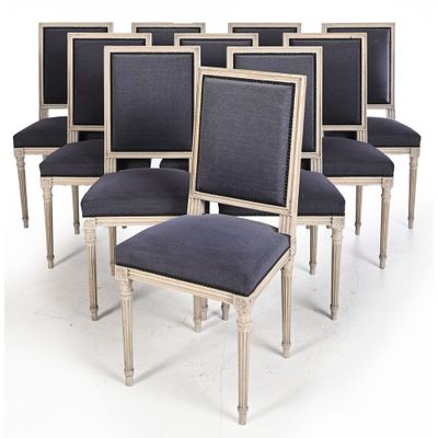 a set of six chairs with blue upholstered seats