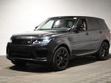 une image d'un Range Rover noir garé dans un garage