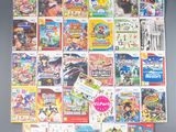une photo montrant une pile de jeux vidéo accrochés au mur