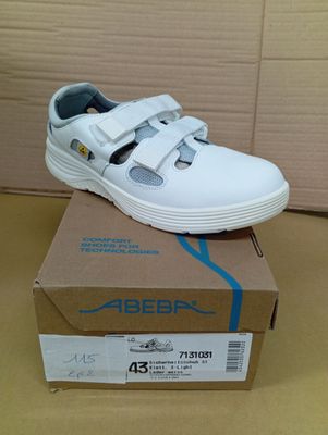 a box with a pair of shoes on top of it