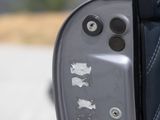 a close up of a black suitcase on the ground