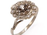 a close up of a ring on a white background