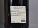 a bottle of wine that is sitting on a table