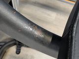 a close up of a black seat on a motorcycle