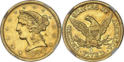 a close up of a gold coin with an eagle on it