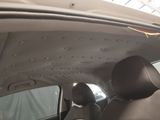 a car that has holes in the roof of it
