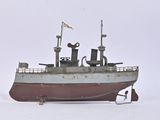 a small boat that is sitting in the snow