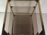 a close up of a glass box with a mirror in it