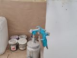 a picture of a workbench with tools hanging on the wall