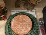 a plate that is sitting on a table next to other items