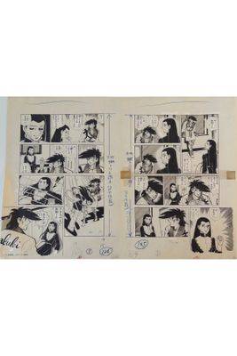 les pages d'une bande dessinée sont étalées sur une table