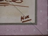 a picture of a picture of a dog with a name written on it