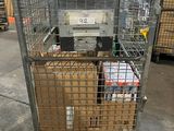 a metal cart with boxes in it in a warehouse