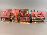 tout un tas de maisons miniatures posées sur une table