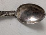 a spoon that is sitting on a table