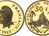 a gold coin with a woman ' s face on it