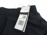 the back of a pair of black shorts with a price tag on it