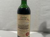 a bottle of wine that is sitting on a table