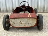 a small toy car with a steering and a steering wheel