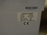 a label on the side of a refrigerator that says spiral mixer