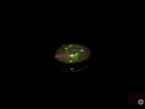 an image of a glowing object in the dark