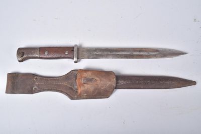 two knives that are sitting next to each other on a table