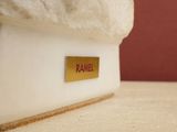 a white box with a label on it sitting on a table
