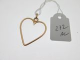 a close up of a tag with a heart on it