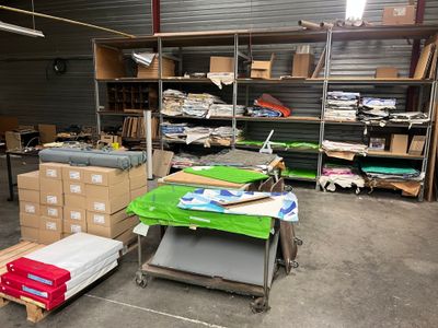 a room with a lot of boxes and boxes on the floor