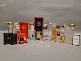 a lot of perfume bottles that are sitting on a table