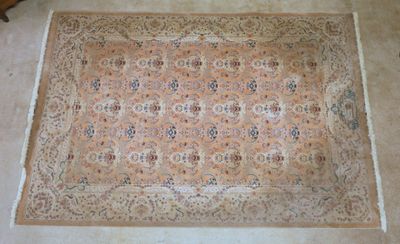a rug on the floor in the middle of the room