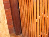 a radiator in the corner of a room next to a wall
