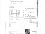 un gros plan d'un document sur lequel figure la photo d'une personne